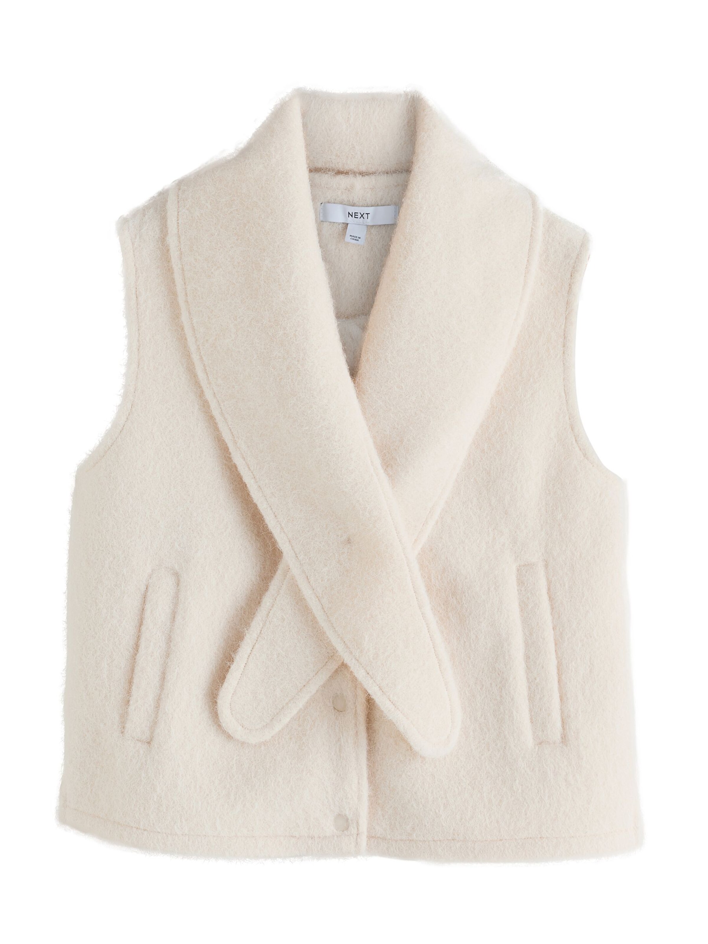 Next Vest S suuruses helepruun, Tootevaade