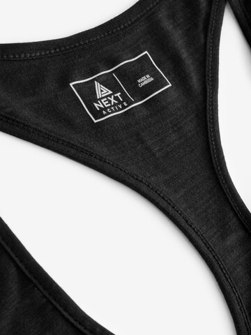 Next Sporttop in Schwarz