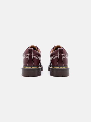 Dr. Martens Δετό παπούτσι 'Lowell 4 Eye' σε κόκκινο