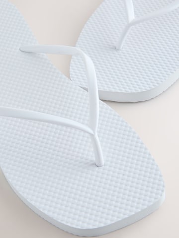 Tongs Next en blanc
