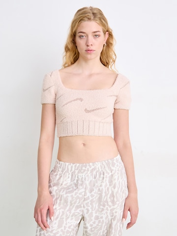 Nike Sportswear Sweter 'Phoenix' w kolorze różowy: przód