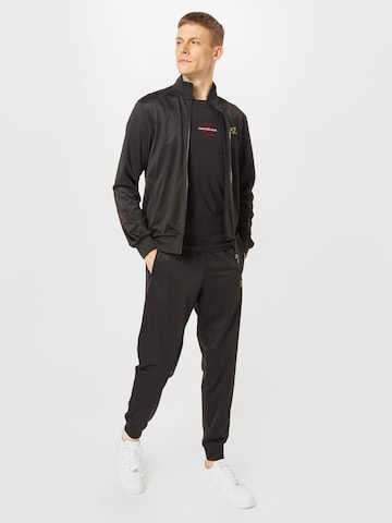 Tuta da jogging di EA7 Emporio Armani in nero