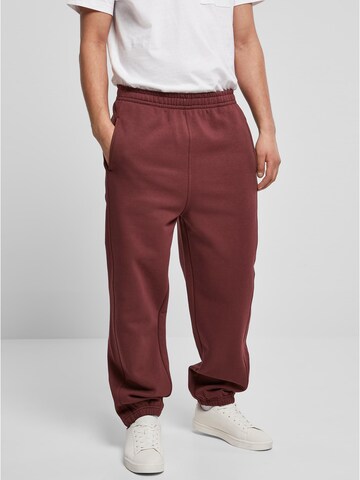 Urban Classics Tapered Trousers in Red: front