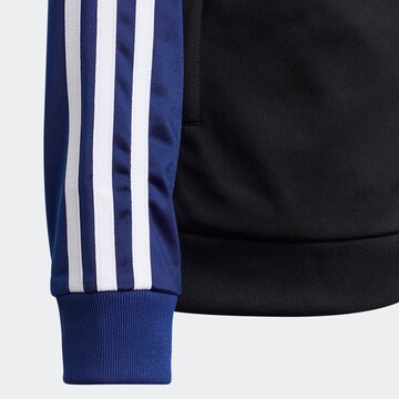 ADIDAS ORIGINALSregular Prijelazna jakna - plava boja