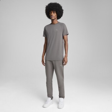 PUMA Slim fit Workout Pants 'Evostripe' in Grey