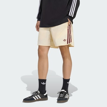 ADIDAS ORIGINALS - Regular Calças 'Sprinter' em amarelo: frente