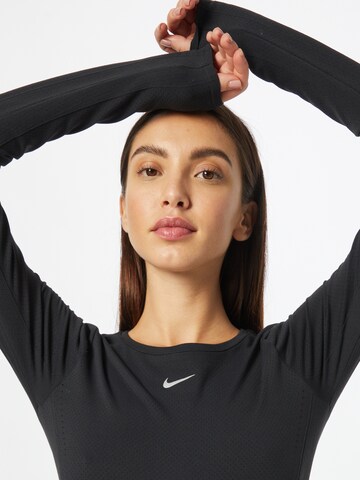 NIKE Sportshirt 'Aura' in Schwarz