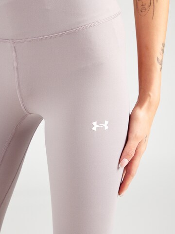 UNDER ARMOUR Skinny Sportnadrágok 'Motion EMEA' - szürke