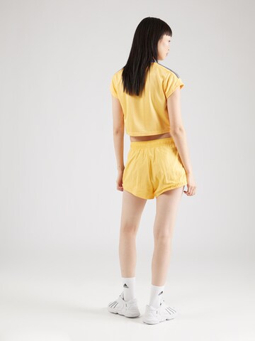 ADIDAS SPORTSWEAR Regular Workout Pants 'TIRO' in Yellow