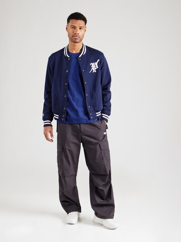 Maglietta di Champion Authentic Athletic Apparel in blu