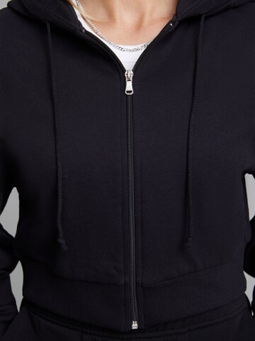 ABOUT YOU x Sharlota Zip-Up Hoodie 'Inaya' in Black