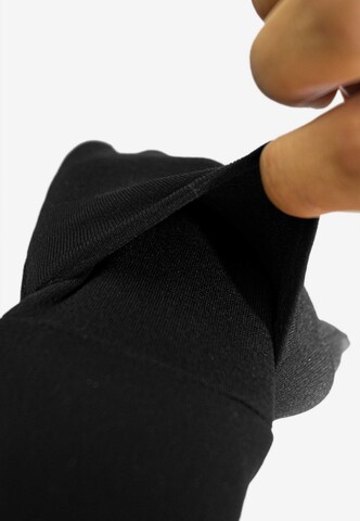 REUSCH Full Finger Gloves 'Heat Liner TOUCH-TEC™' in Black