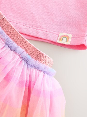 Set Next en rose