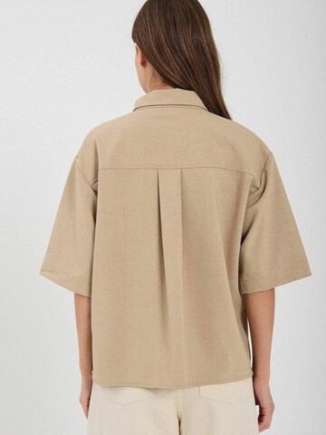 Maglietta di NORR in beige