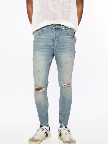 Pull&BearSkinny Traperice - plava boja: prednji dio