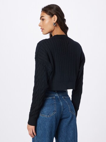 Pull-over Tommy Jeans en noir