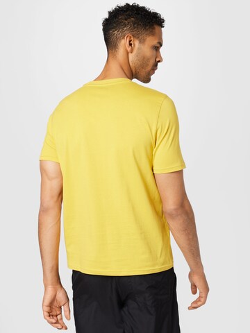 PUMA Sportshirt in Gelb