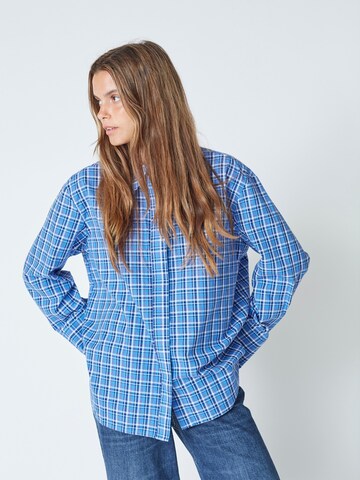 Chemisier 'Angelica' co'couture en bleu : devant