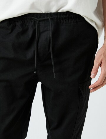 Koton Tapered Cargo trousers in Black