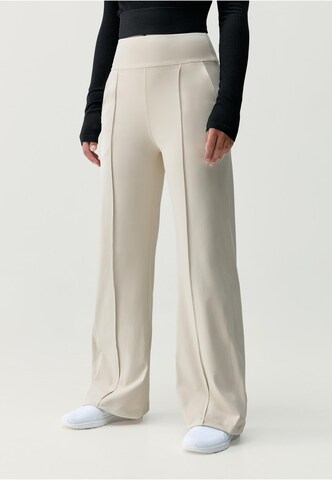 Born Living Yoga Wide leg Sportbroek 'Lua' in Beige: voorkant