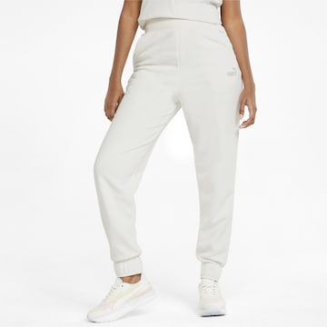 PUMA Tapered Workout Pants in White: front