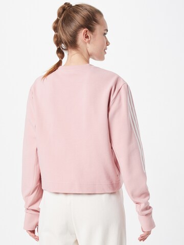 ADIDAS SPORTSWEAR - Sweatshirt de desporto em rosa