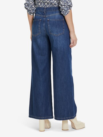 Cartoon Tapered Jeans in Blue