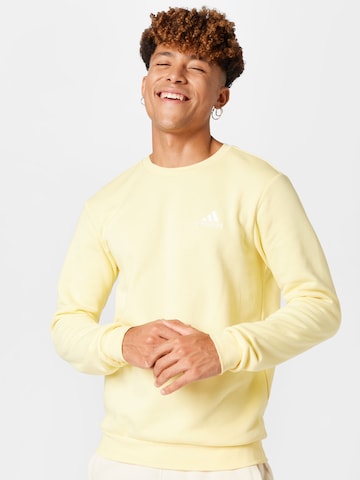 ADIDAS SPORTSWEAR Αθλητική μπλούζα φούτερ 'Essentials Fleece' σε κίτρινο: μπροστά
