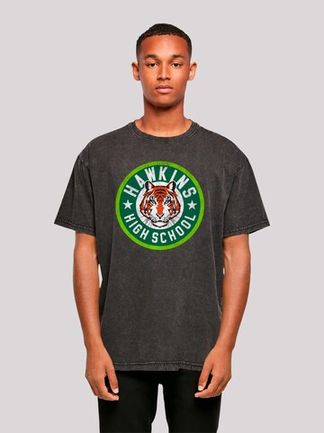 T-Shirt 'Stranger Things Hawkins Netflix TV Series' F4NT4STIC en noir : devant