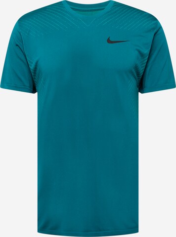 T-Shirt fonctionnel NIKE en bleu : devant