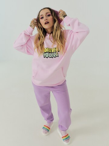 ABOUT YOU x Sharlota Sweatshirt 'Sharlota' in Pink: front