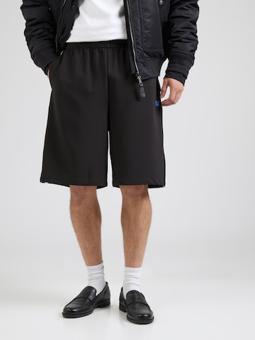Loosefit Pantalon Calvin Klein Jeans en noir : devant