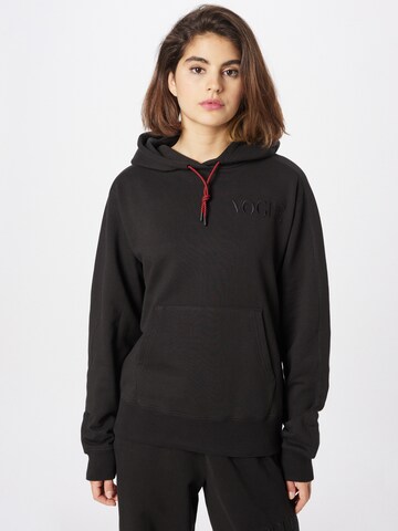 PUMASweater majica 'x Vogue Collection' - crna boja: prednji dio