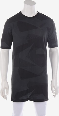 PUMA Shirt in M-L in Black: front