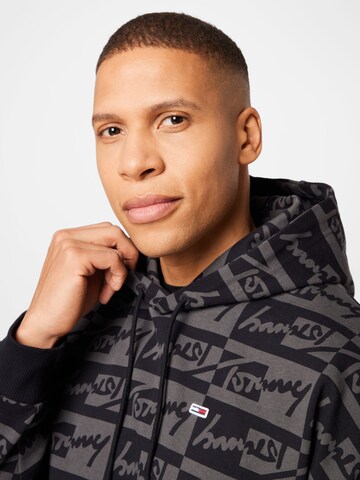 Tommy Jeans - Sudadera con cremallera 'Signature' en negro