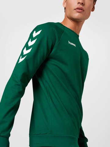 Hanorac sport de la Hummel pe verde