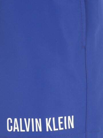 Calvin Klein Swimwear Plavecké šortky – modrá