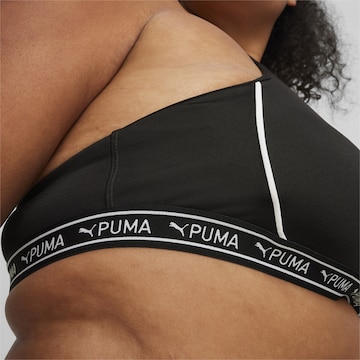 PUMA Bustier Sporttop in Schwarz