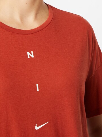 T-shirt fonctionnel NIKE en rouge
