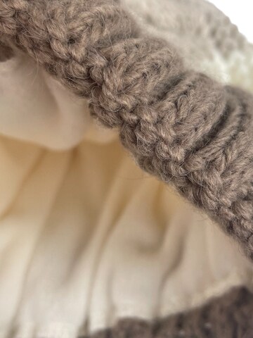 Kumixi Mütze 'Bommelmütze' in Braun