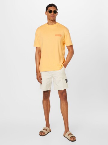 Calvin Klein Jeans T-shirt i orange