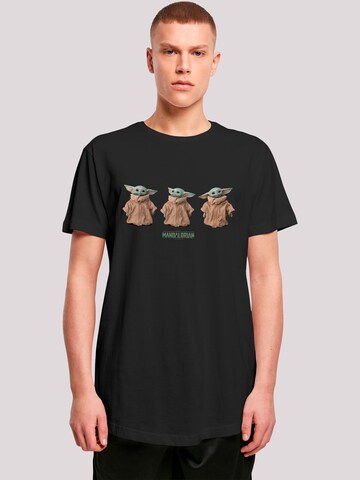 T-Shirt 'Star Wars The Mandalorian The Child Poses' F4NT4STIC en noir : devant