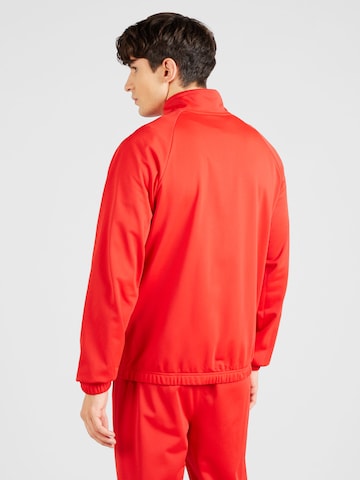 Nike Sportswear - Fato de jogging em vermelho