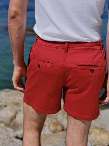 Next - regular Pantalón plisado en rojo