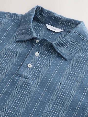 Tricou de la Next pe albastru