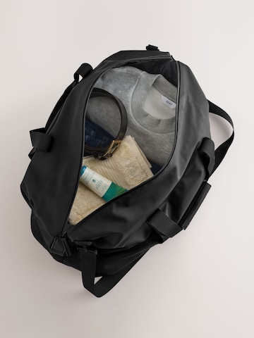 Next - Bolsa de viaje en negro