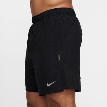 NIKE Regular Workout Pants 'Challenger' in Black