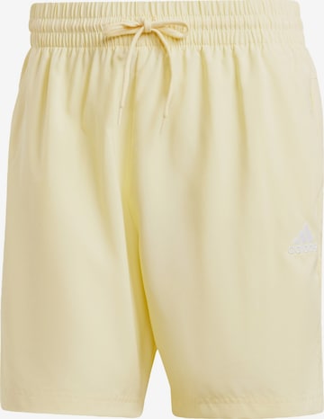 ADIDAS SPORTSWEAR Regular Workout Pants 'Essentials Chelsea' in Yellow: front