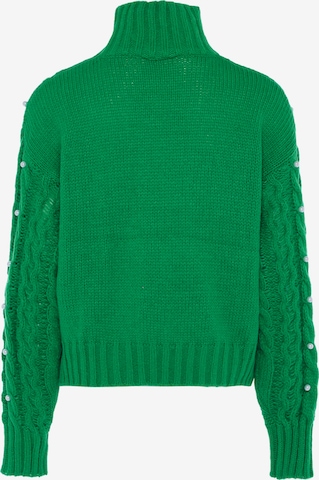 Pullover di faina in verde