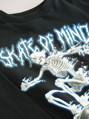 Next - Camiseta en negro